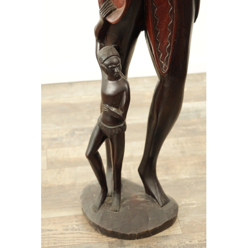 922 - A LARGE AFRICAN HARDWOOD SCULPTURE OF FEMALE WITH A CHILD (159cm high)