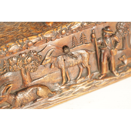 923 - A 19TH CENTURY BLACK FOREST CARVED LINDEN WOOD JEWELLERY BOX with figural hinged lid and farm yard s... 