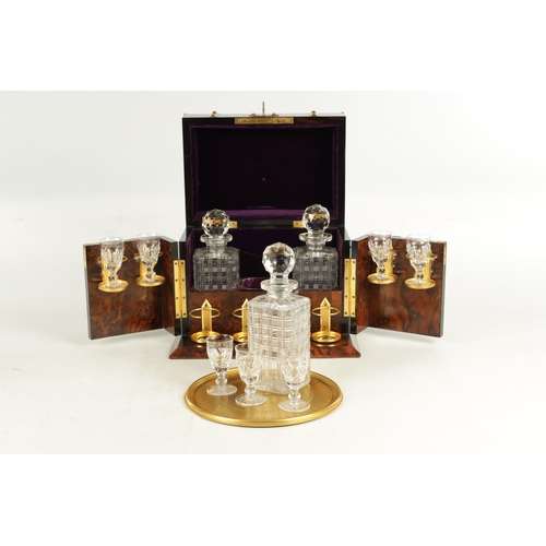 924 - A FINE VICTORIAN FIGURED WALNUT AND GILT CUT BRASS MOUNTED SPIRIT TANTALUS LABELLED EDWARDS & JONES,... 