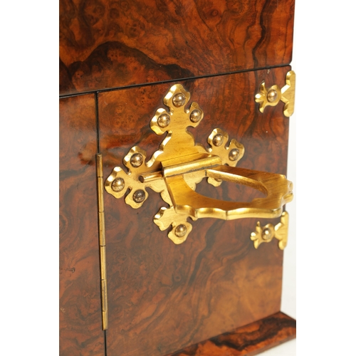 924 - A FINE VICTORIAN FIGURED WALNUT AND GILT CUT BRASS MOUNTED SPIRIT TANTALUS LABELLED EDWARDS & JONES,... 