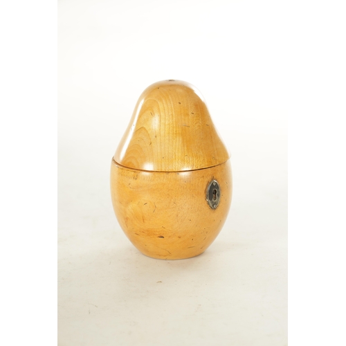 927 - A GEORGE III FRUIT WOOD TEA CADDY FORMED AS A PEAR with hinged top and oval silvered brass escutcheo... 