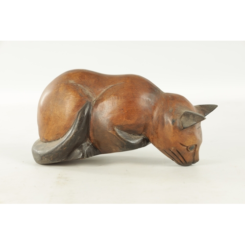 931 - A 19TH CENTURY CARVED SCULPTURE OF A CAT (30cm wide )