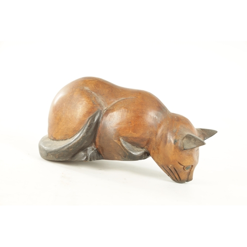 931 - A 19TH CENTURY CARVED SCULPTURE OF A CAT (30cm wide )