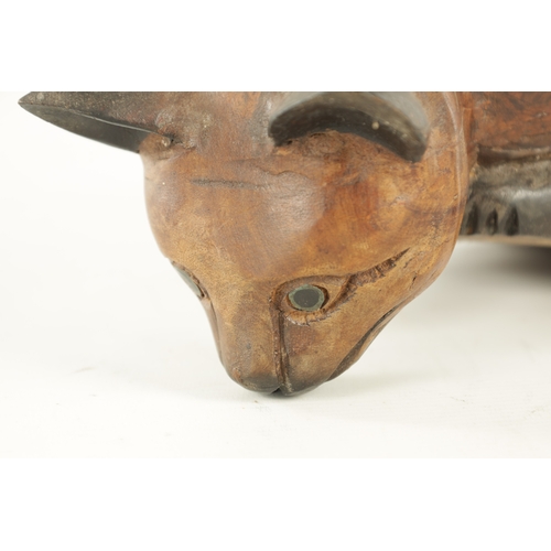 931 - A 19TH CENTURY CARVED SCULPTURE OF A CAT (30cm wide )