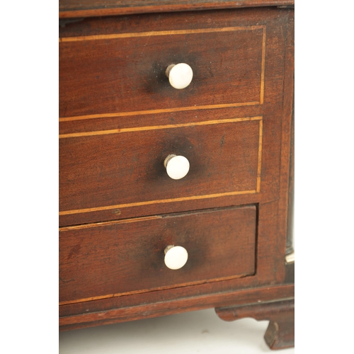 932 - A 19TH CENTURY MAHOGANY WORK BOX FORMED AS A MINIATURE CHEST with hinged lid above two dummy drawers... 