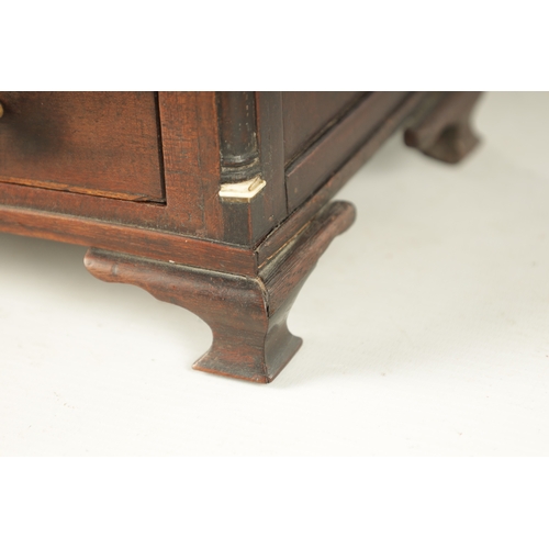 932 - A 19TH CENTURY MAHOGANY WORK BOX FORMED AS A MINIATURE CHEST with hinged lid above two dummy drawers... 