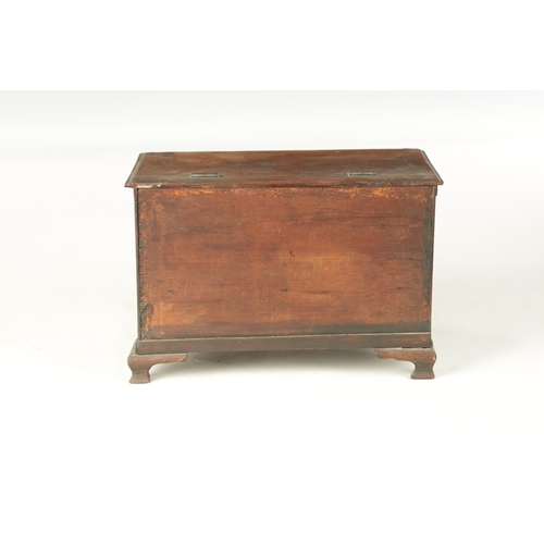 932 - A 19TH CENTURY MAHOGANY WORK BOX FORMED AS A MINIATURE CHEST with hinged lid above two dummy drawers... 