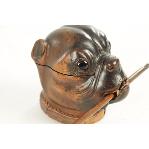 937 - A GOOD 19TH CENTURY CARVED WOOD INK STAND FORMED AS THE HEAD OF A BULLDOG the colour-tinted head wit... 