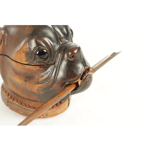 937 - A GOOD 19TH CENTURY CARVED WOOD INK STAND FORMED AS THE HEAD OF A BULLDOG the colour-tinted head wit... 