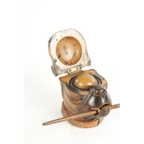 937 - A GOOD 19TH CENTURY CARVED WOOD INK STAND FORMED AS THE HEAD OF A BULLDOG the colour-tinted head wit... 