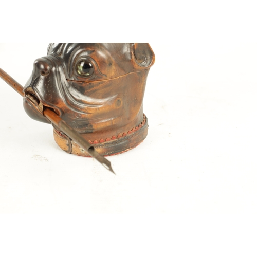 937 - A GOOD 19TH CENTURY CARVED WOOD INK STAND FORMED AS THE HEAD OF A BULLDOG the colour-tinted head wit... 