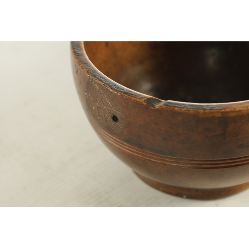 938 - A JOINED PAIR OF 19TH CENTURY WELSH TREEN CAWL BOWLS, with carved banding around the bodies and rais... 