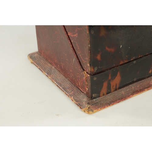 945 - A 19TH CENTURY TORTOISESHELL VENEERED STATIONARY BOX, with a curved hinged lid and red moroccon leat... 