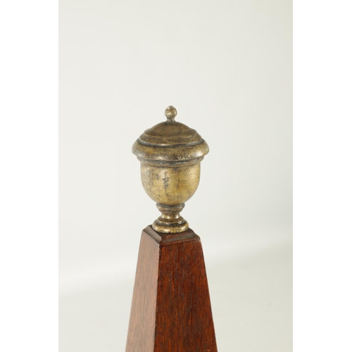 946 - A 19TH CENTURY OAK OBLISK with painted turned finial and inset medallion having a crown and cross ke... 