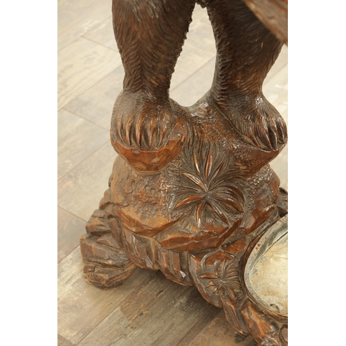 951 - A 19TH CENTURY CARVED LINDEN WOOD BLACK FOREST BEAR AND CUB HALL STAND depicting a carved standing b... 