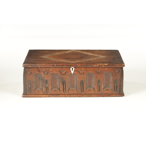 953 - AN EARLY 18TH CENTURY OAK DEED BOX with arcaded carved frieze and lozenge-shaped top fitted with bon... 