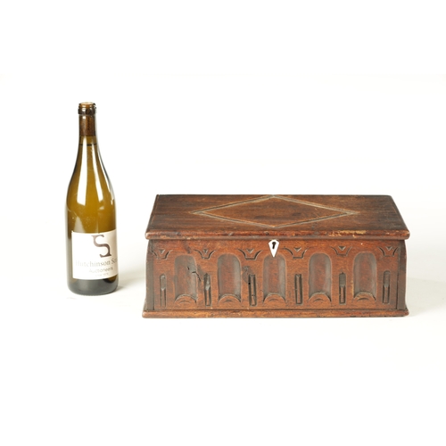 953 - AN EARLY 18TH CENTURY OAK DEED BOX with arcaded carved frieze and lozenge-shaped top fitted with bon... 