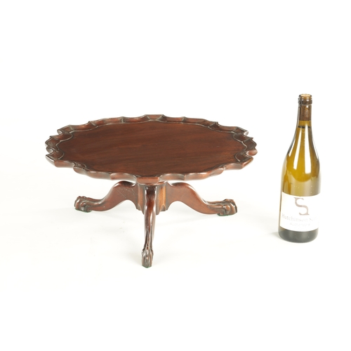 954 - A 19TH CENTURY MAHOGANY LAZY SUSAN with revolving pie crust top on a triform cabriole leg base with ... 