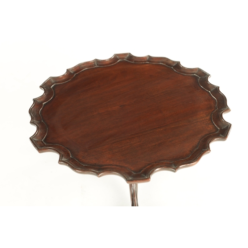 954 - A 19TH CENTURY MAHOGANY LAZY SUSAN with revolving pie crust top on a triform cabriole leg base with ... 