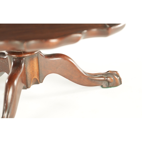 954 - A 19TH CENTURY MAHOGANY LAZY SUSAN with revolving pie crust top on a triform cabriole leg base with ... 