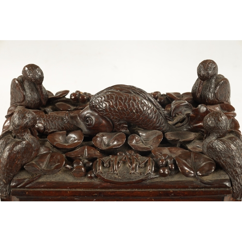 958 - AN IMPRESSIVE 18TH CENTURY CONTINENTAL CARVED HARDWOOD TABLE CASKET concave canted corners below a h... 