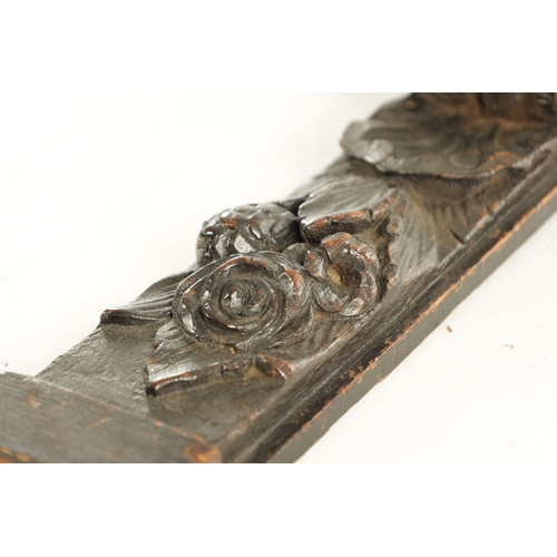 960 - A 17TH/18TH CENTURY CARVED OAK CARYATID PILASTER with scrolled top draping leaf and flowerhead spray... 