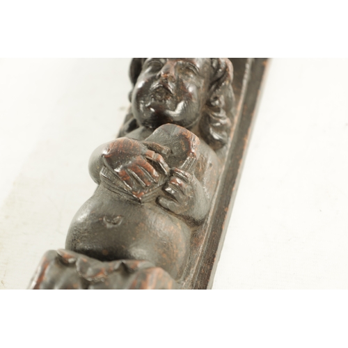 960 - A 17TH/18TH CENTURY CARVED OAK CARYATID PILASTER with scrolled top draping leaf and flowerhead spray... 