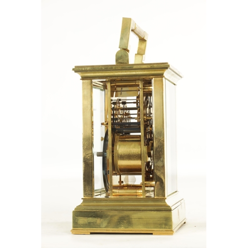 1002 - A LATE 19TH CENTURY FRENCH GIANT STRIKING CARRIAGE CLOCK, the brass glazed case enclosing a white en... 