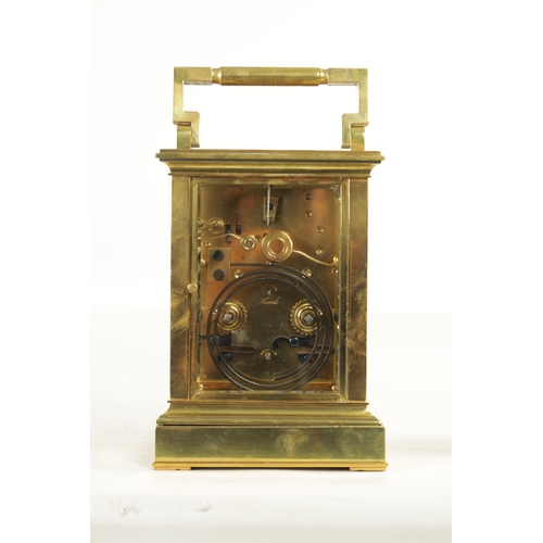 1002 - A LATE 19TH CENTURY FRENCH GIANT STRIKING CARRIAGE CLOCK, the brass glazed case enclosing a white en... 