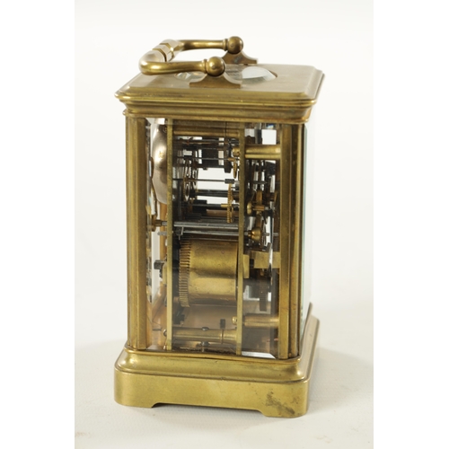 1007 - A LATE 19TH CENTURY BRASS STRIKING CARRIAGE CLOCK with a white enamel dial having a Roman chapter ri... 