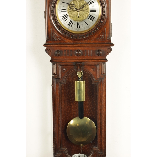 1010 - A. BERTL, WIEN. AN UNUSUAL OAK CASED WEIGHT DRIVEN VIENNA WALL CLOCK, the carved arched top case wit... 