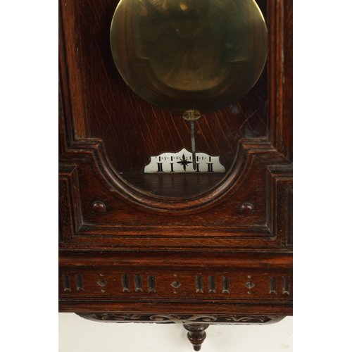 1010 - A. BERTL, WIEN. AN UNUSUAL OAK CASED WEIGHT DRIVEN VIENNA WALL CLOCK, the carved arched top case wit... 