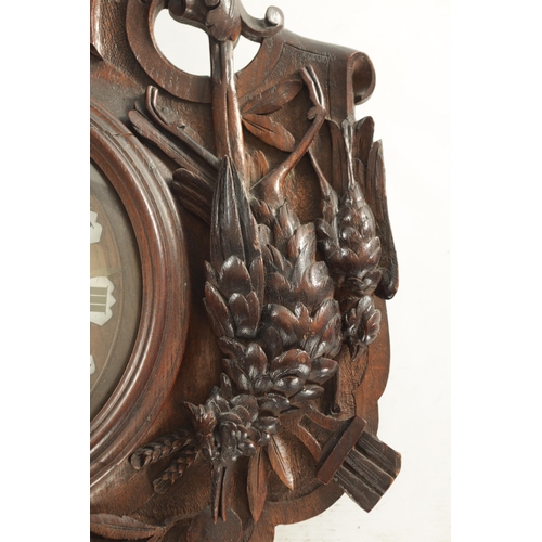 1015 - A 19TH CENTURY BLACK FOREST CARVED OAK HANGING WALL CLOCK with scrolled case having a boar's head su... 