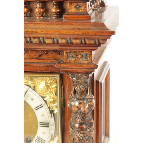 1022 - A LATE 19TH CENTURY GERMAN WALNUT QUARTER CHIMING BRACKET CLOCK, with carved caryatid columns enclos... 