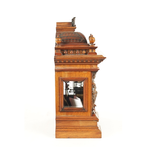 1022 - A LATE 19TH CENTURY GERMAN WALNUT QUARTER CHIMING BRACKET CLOCK, with carved caryatid columns enclos... 