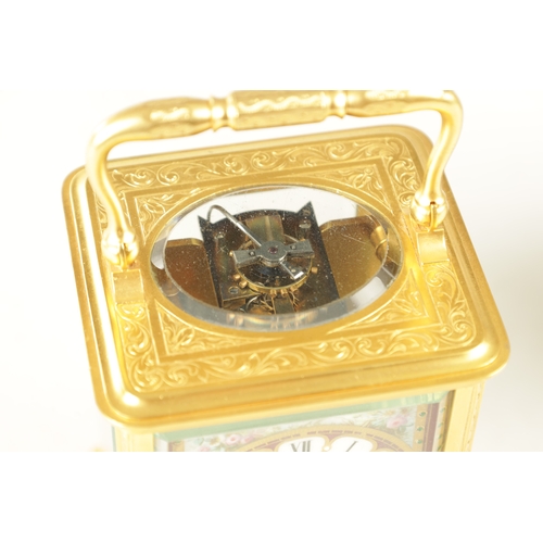 1026 - A LATE 19TH CENTURY FRENCH GILT ENGRAVED CARRIAGE CLOCK the gilt brass case with scroll work engravi... 