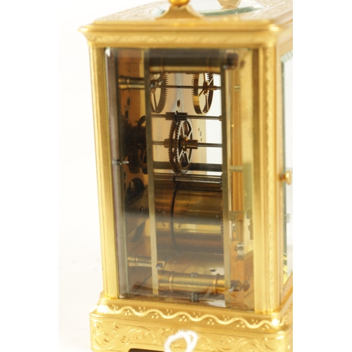 1026 - A LATE 19TH CENTURY FRENCH GILT ENGRAVED CARRIAGE CLOCK the gilt brass case with scroll work engravi... 