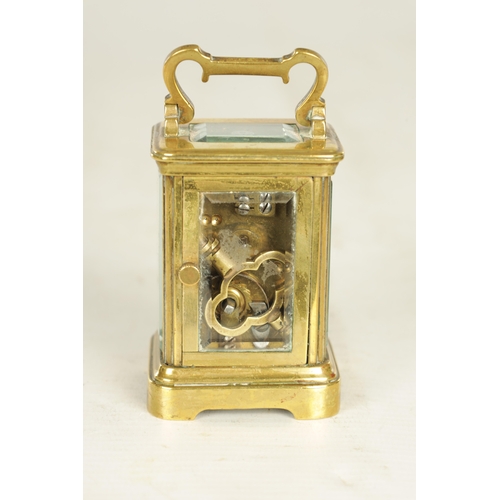 1027 - A LATE 19TH CENTURY FRENCH BRASS MINIATURE CARRIAGE CLOCK the plain case with decorative borders and... 