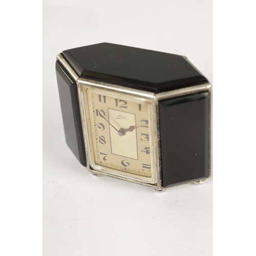 1032 - AN ART DECO SWISS SILVER AND BLACK ONYX BOUDOIR CLOCK SIGNED MIDO, the silver case set with five bev... 