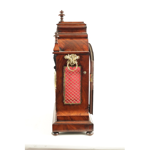 1035 - A WILLIAM IV FIGURED MAHOGANY DOUBLE FUSEE BRACKET CLOCK having a shaped pediment above a foliate ca... 