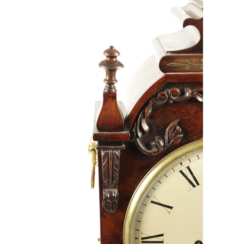 1035 - A WILLIAM IV FIGURED MAHOGANY DOUBLE FUSEE BRACKET CLOCK having a shaped pediment above a foliate ca... 