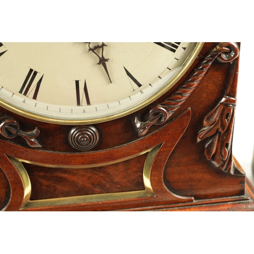 1035 - A WILLIAM IV FIGURED MAHOGANY DOUBLE FUSEE BRACKET CLOCK having a shaped pediment above a foliate ca... 