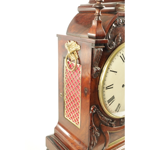 1035 - A WILLIAM IV FIGURED MAHOGANY DOUBLE FUSEE BRACKET CLOCK having a shaped pediment above a foliate ca... 