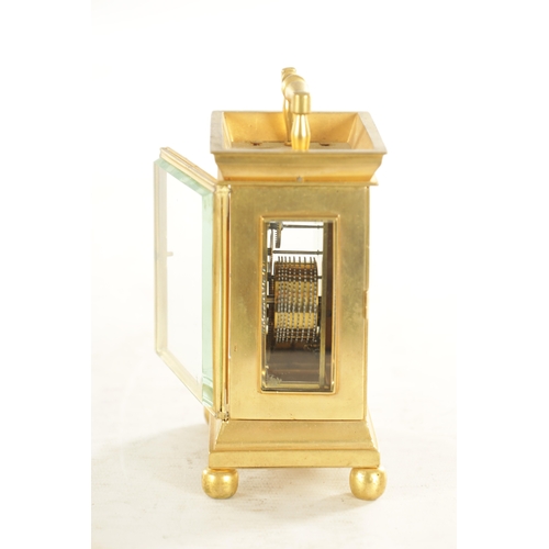 1036 - A 19TH CENTURY ENGLISH BRASS FUSEE CARRIAGE CLOCK the plain case with a raised fixed handle on ball ... 