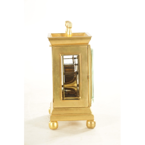 1036 - A 19TH CENTURY ENGLISH BRASS FUSEE CARRIAGE CLOCK the plain case with a raised fixed handle on ball ... 