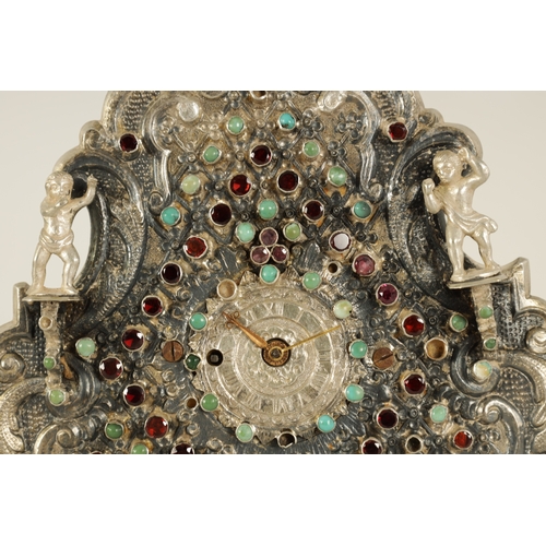 1053 - A CASED 19TH CENTURY AUSTRO HUNGARIAN JEWELLED SILVER STRUT CLOCK decorated with figures and cut cab... 