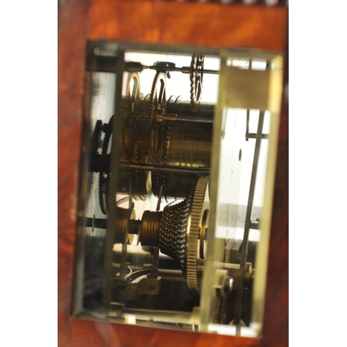 1056 - JAMES BANNISTER, LONDON. A MID 19TH CENTURY FIGURED MAHOGANY LIBRARY CLOCK, the glazed case with car... 