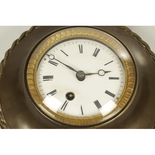 1070 - AN EARLY 19TH CENTURY FRENCH BRONZE CARTEL CLOCK, the moulded case with rope edge moulding and gilt ... 