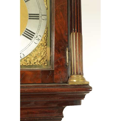 1071 - JOHN TOMBS, LONDON. A GEORGE III FIGURED MAHOGANY LONGCASE CLOCK, the case with swan neck pediment a... 