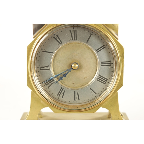 1073 - A LATE 19TH CENTURY FRENCH INDUSTRIAL DESK CLOCK the brass case surmounted by a handle and silvered ... 